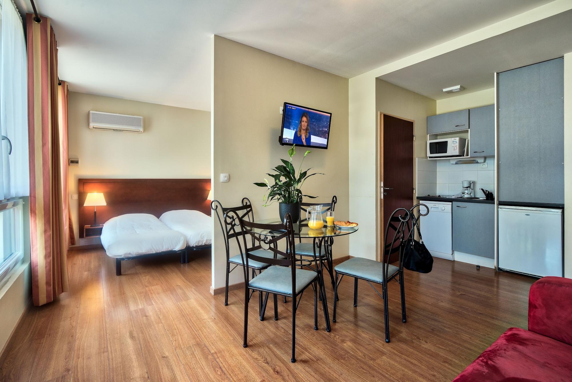 Residence Les Jardins De Lourdes Bagian luar foto